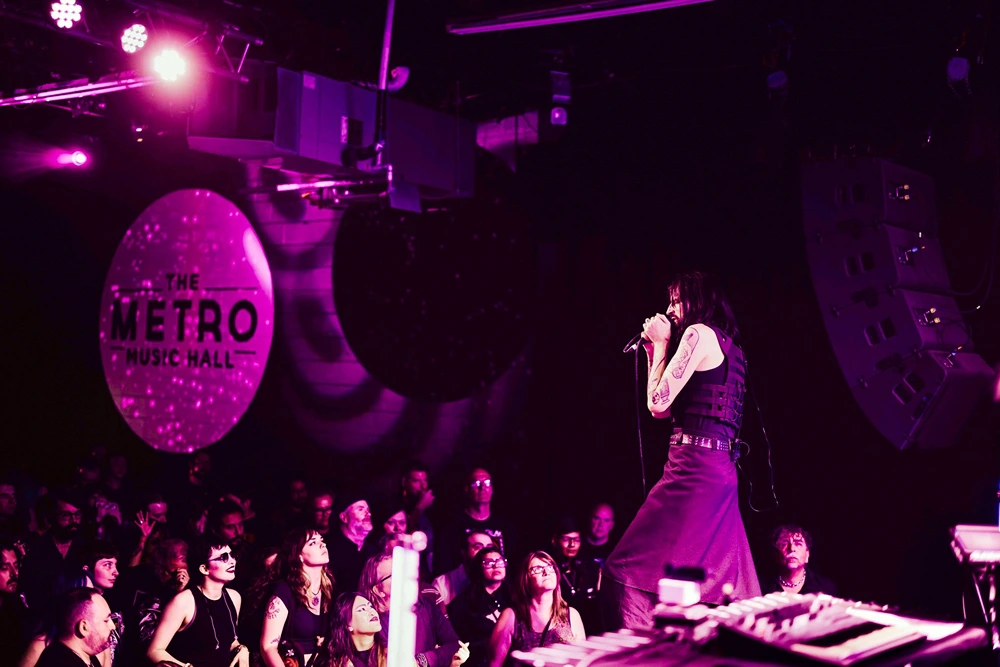 ULTRA RUNN performing in front of a crowd.